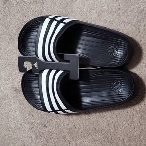 Adidas size 4 kids or 6 adult female